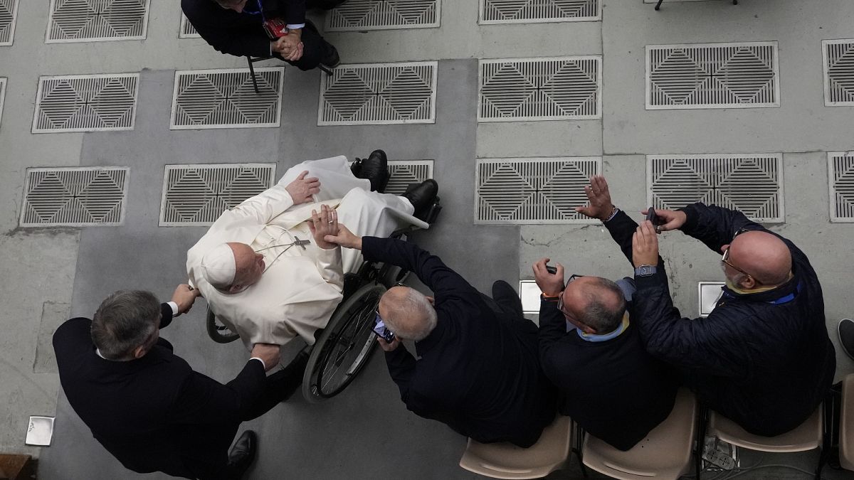Pope Francis leaves after an audience with sick people and Lourdes pilgrimage operators in the Paul VI Hall, at the Vatican, Thursday, December 14, 2023.