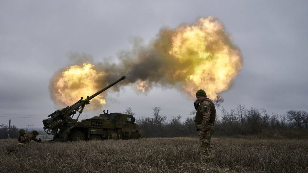 Ukrainian soldiers fire a French-made CAESAR self-propelled howitzer towards Russian positions near Avdiivka, Donetsk region, Ukraine, Monday, Dec. 26, 2022.