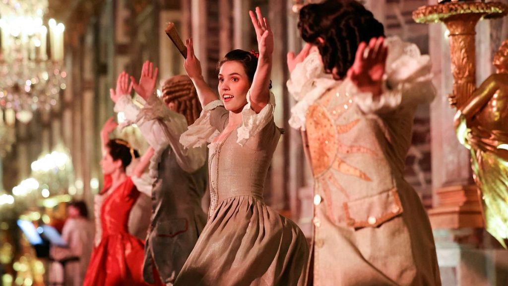 Dancers of the Royal Opera Ballet in period costumes perform in the "Galerie des Glaces" as part of the so-called "Parcours du Roi" (The King