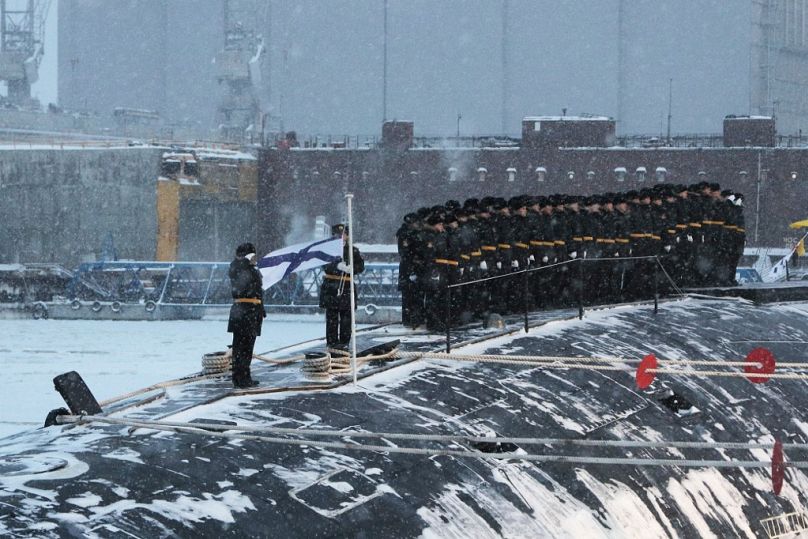Cette photo distribuée par l'agence d'État russe Spoutnik montre le nouveau sous-marin nucléaire Imperor Alexander III lors d'une cérémonie de lever du drapeau le 11 décembre 2023.