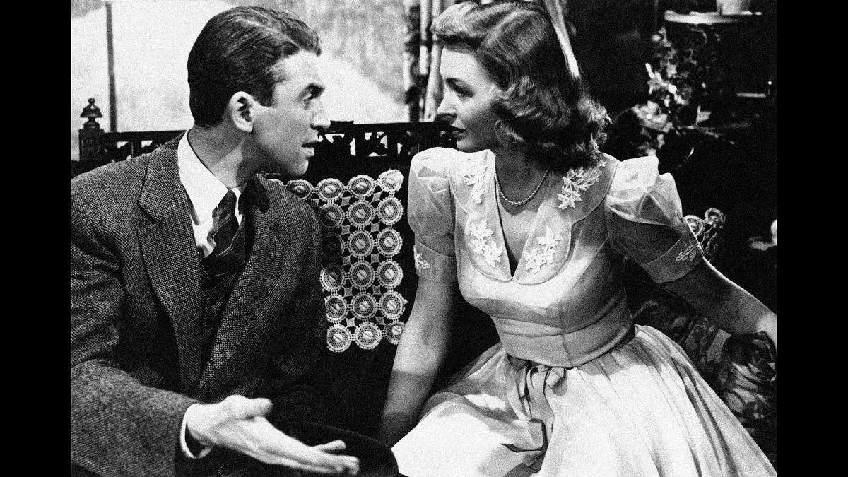 Jimmy Stewart explains things to Donna Reed in “It’s a Wonderful Life” 1946.