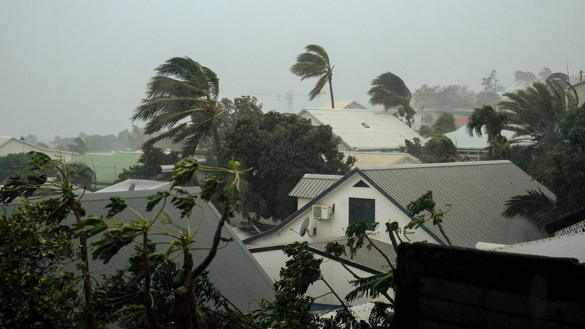 Strong winds blow in the town of La Plaine Saint-Paul on the French Indian Ocean island of Reunion, 15 January 2024.