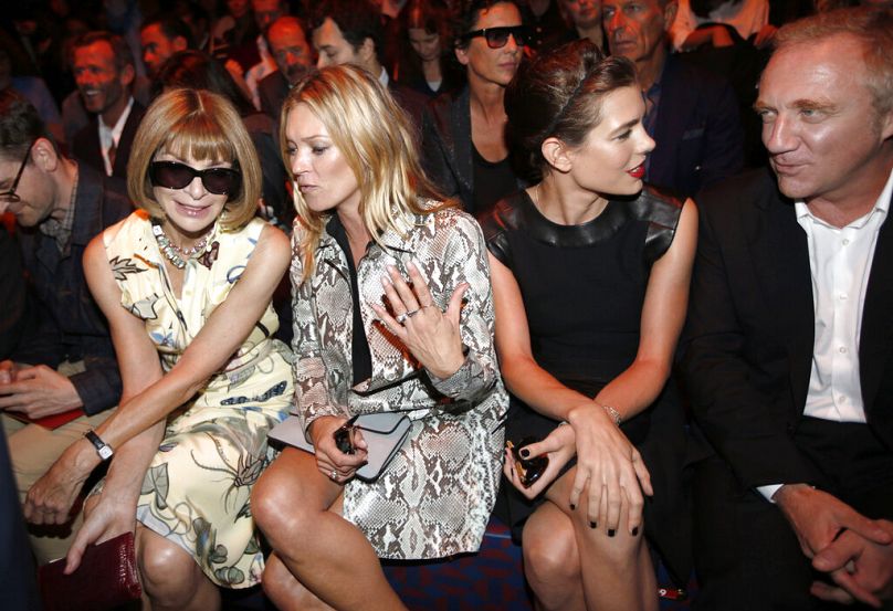 Anna Wintour, Kate Moss, la princesse Charlotte Casiraghi et François Pinault assistent au défilé Gucci Femme Printemps-Été 2015 lors de la Fashion Week de Milan le 17 septembre 2014.