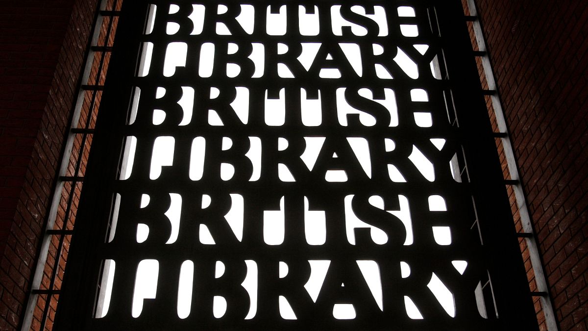 British Library signs are seen over an entrance to the library in London.