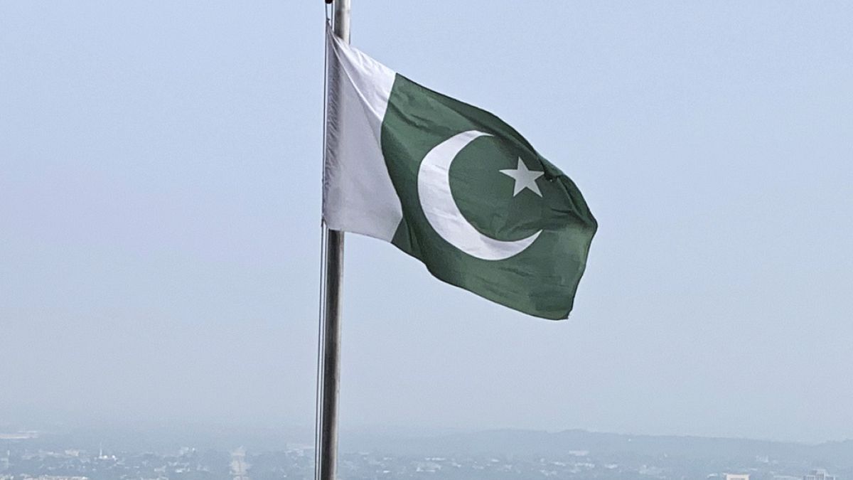 FILE - A Pakistani flag flies on a lookout in Islamabad, Pakistan, on July 27, 2022. Pakistan