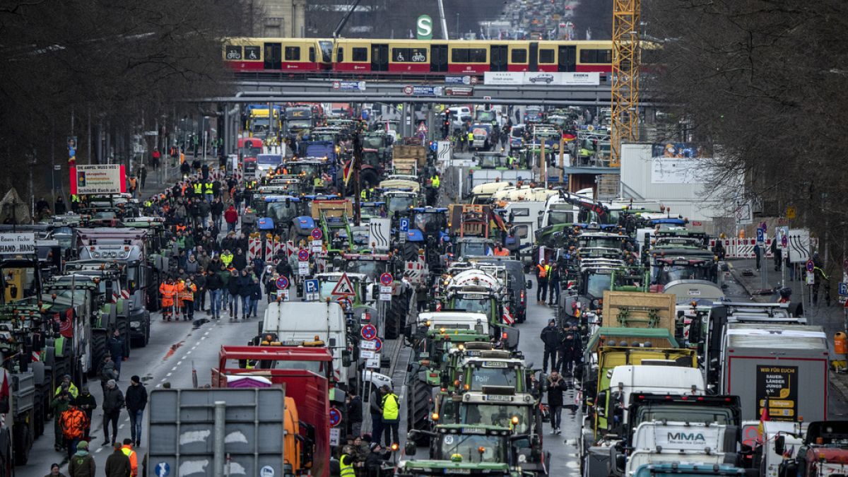 Farmers with tractors arrive for a protest at the government district in Berlin, Germany, Monday, Jan 15, 2024.