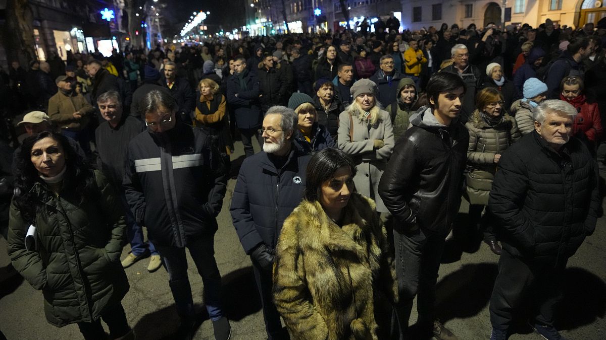 People gather during protest in front of Serbia