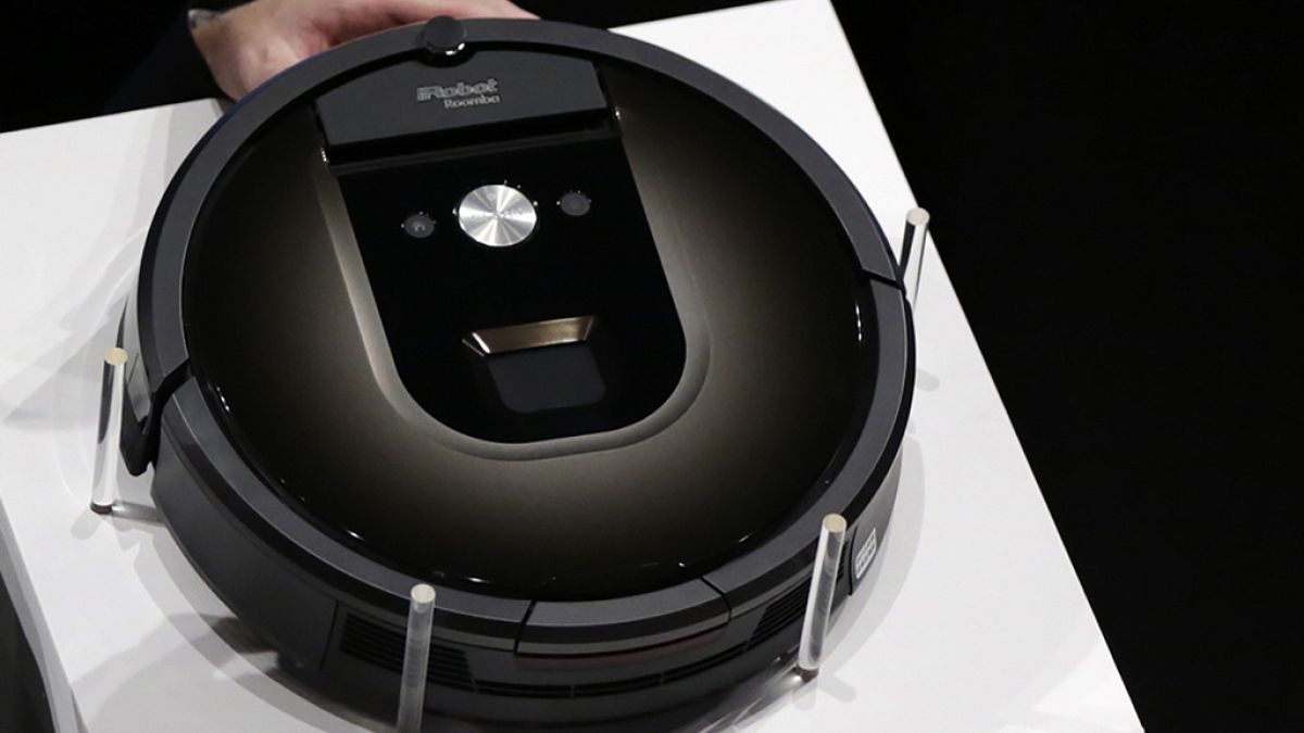 A Roomba 980 vacuum cleaning robot is presented during a presentation in Tokyo, Tuesday, Sept. 29, 2015.