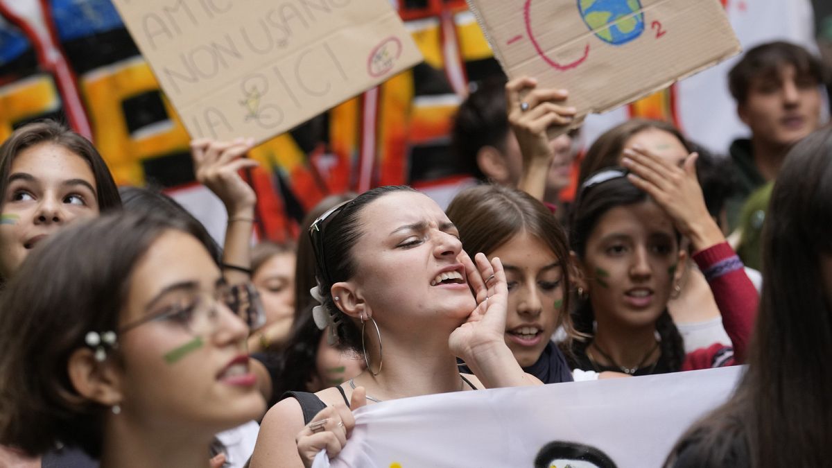 People demonstrate during a rally of the climate protection movement Fridays for Future, in Milan, Italy, Friday, Oct. 6, 2023