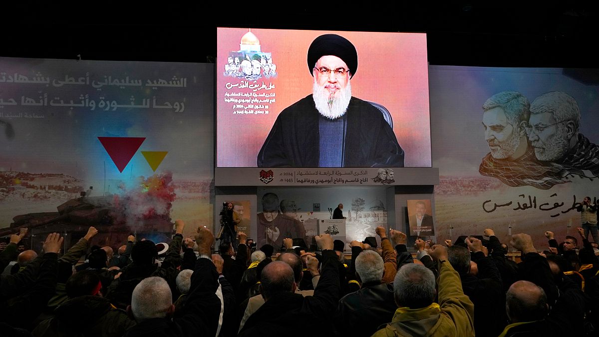 Hezbollah leader Sayyed Hassan Nasrallah speaks via a video link during a ceremony in Beirut, Lebanon, Wednesday, Jan. 3, 2024.