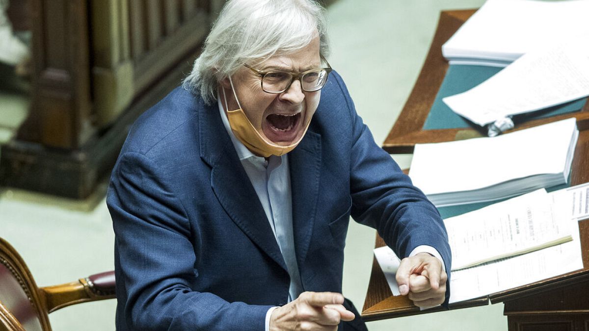 Vittorio Sgarbi shouts as he argues with other lawmakers during a debate on Justice in Italy