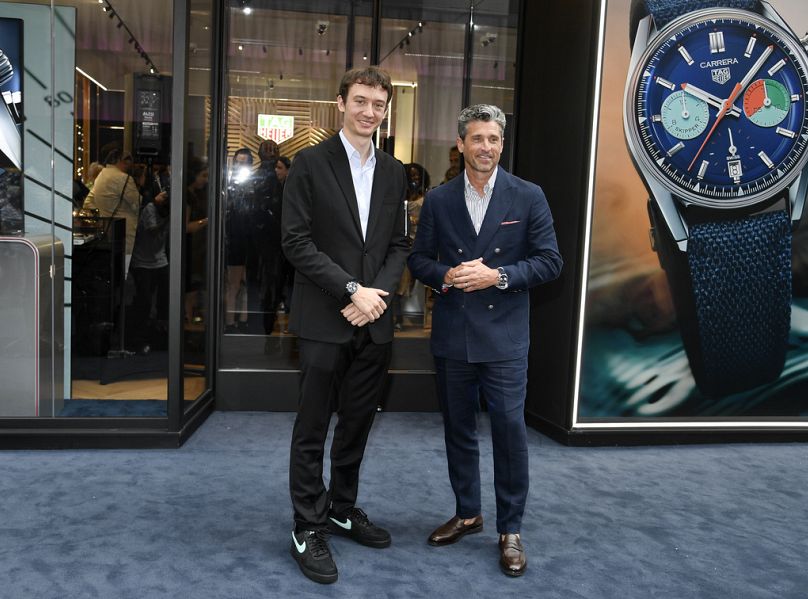 Frédéric Arnault et l'acteur américain Patrick Dempsey à New York lors de l'ouverture du magasin phare TAG Heuer Fifth Avenue en juillet 2023.