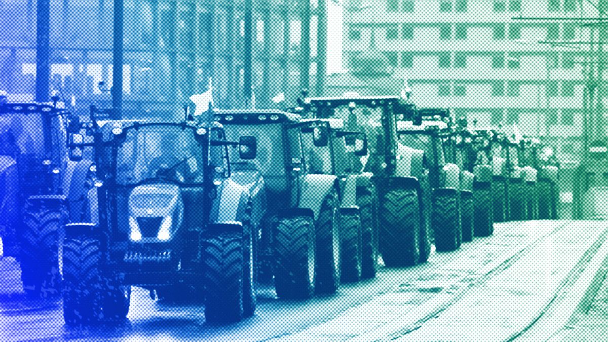 Farmers driving in a heavy-duty tractor into the western city of Poznan as part of a nationwide farmer protest against European Union