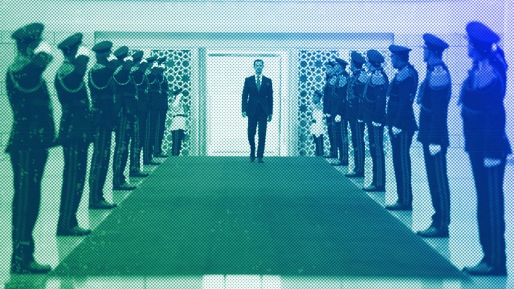 Bashar Assad, reviews an honor guard at the Syrian Presidential Palace in the capital Damascus, July 2021