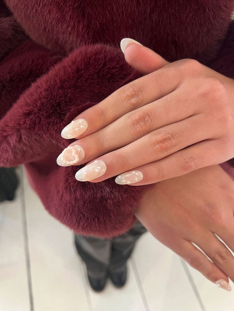 Cette photo fournie par Julie Kandalec montre Coquette Nails, The Gel Bottle.