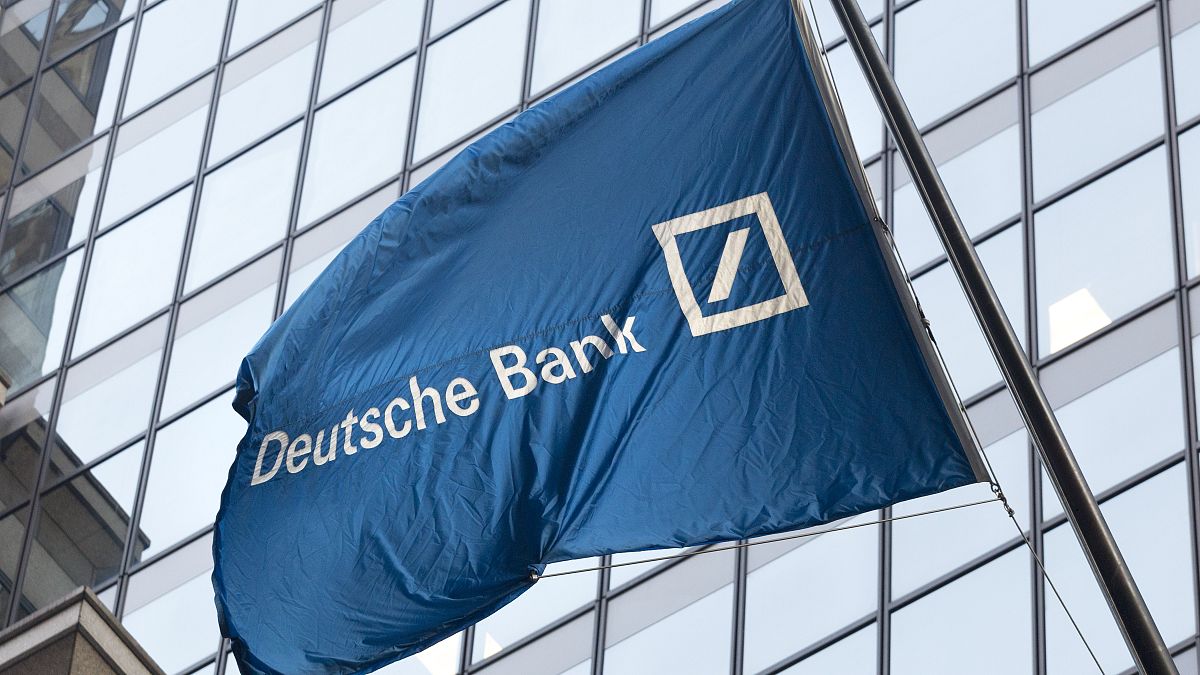 A flag for Deutsche Bank flies outside the German bank