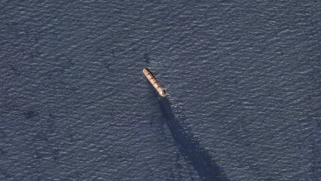 The Belize-flagged bulk carrier Rubymar is seen in the southern Red Sea near the Bay el-Mandeb Strait leaking oil after an attack by Yemen