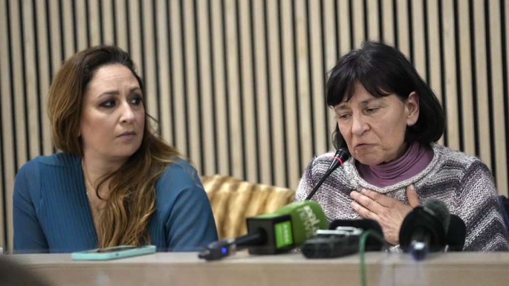 Lawyer Laura Sgro, left, listens to Gloria Branciani during a press conference in Rome, Feb. 21, 2024.