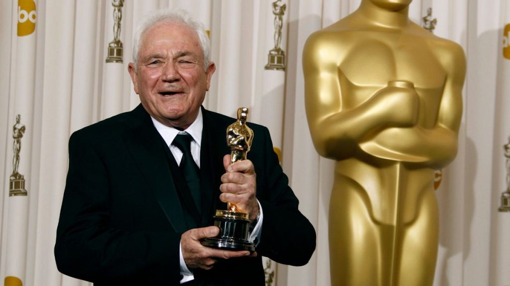 David Seidler poses backstage with the Oscar for best original screenplay for