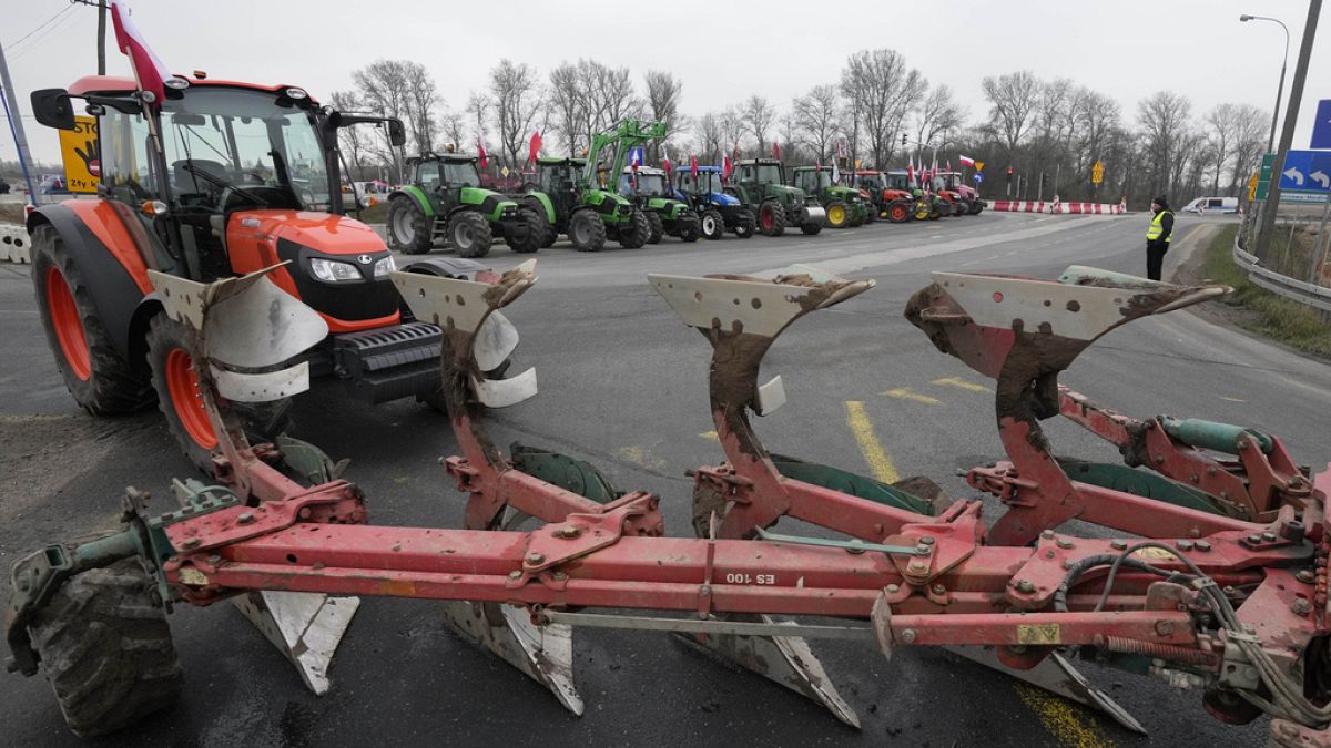 Polish farmers block roads with tractors in Kazun Polski near Warsaw, Poland, on Wednesday March 20, 2024