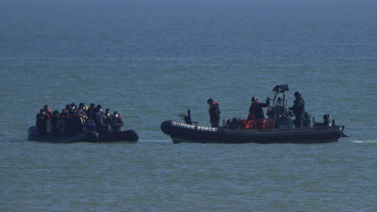 A British Border Force patrol boat intercepts a rib with people thought to be migrants off the the coast at Dungeness, England, Thursday, Sept. 16, 2021.
