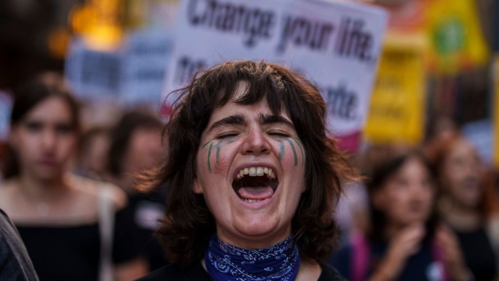 A woman takes part in a Global Climate Strike
