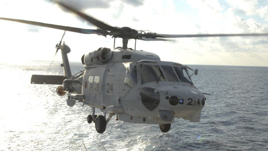 This undated photo released by and taken from the official website of the Japan Maritime Self-Defense Force, shows a SH-60K chopper