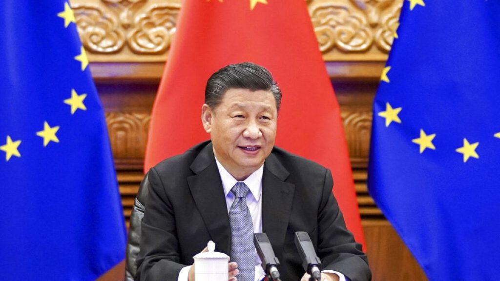 In this photo released by Xinhua News Agency, Chinese President Xi Jinping speaks during a video conference with European leaders from Beijing on Wednesday, Dec. 30, 2020.