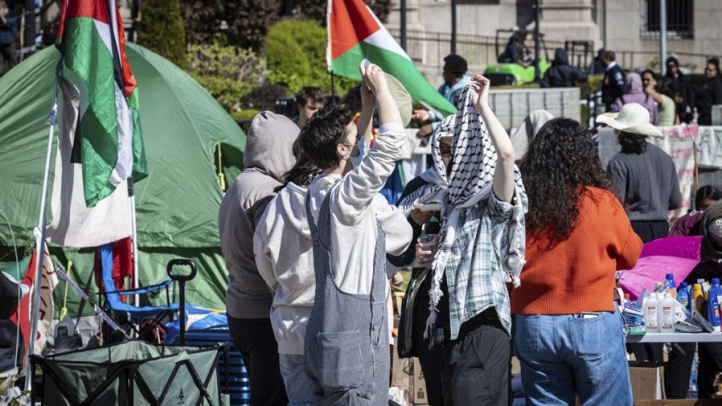 Student protesters at pro-Palestinian demonstration at Columbia University campus in New York, Monday, April 22, 2024. (AP Photo/Stefan Jeremia