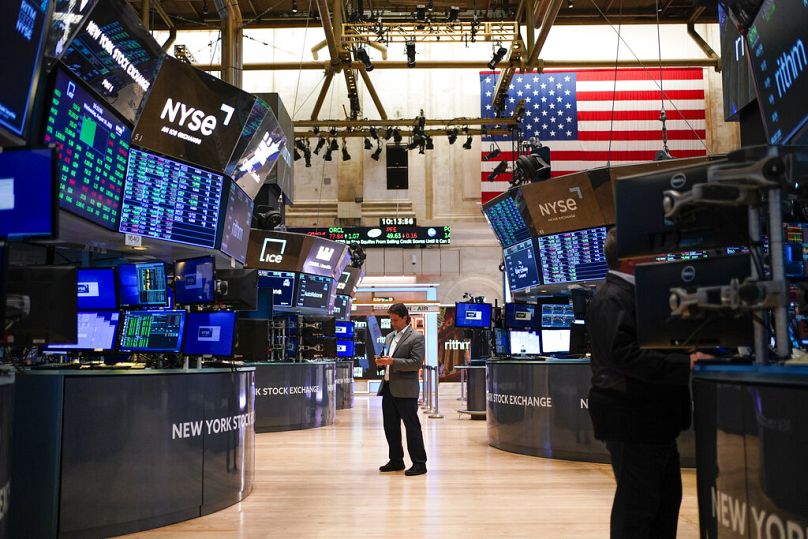 Les traders travaillent sur le parquet de la Bourse de New York, à New York, en septembre 2022