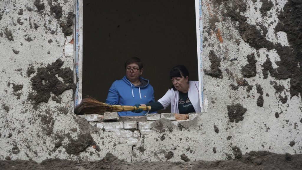 Nurses clean up in the room after a Russian attack on mental hospital №3 in Kharkiv, Ukraine, Saturday, April 27, 2024.