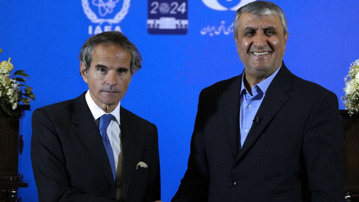 International Atomic Energy Organization, IAEA, Director General Rafael Grossi, left, and head of Iran