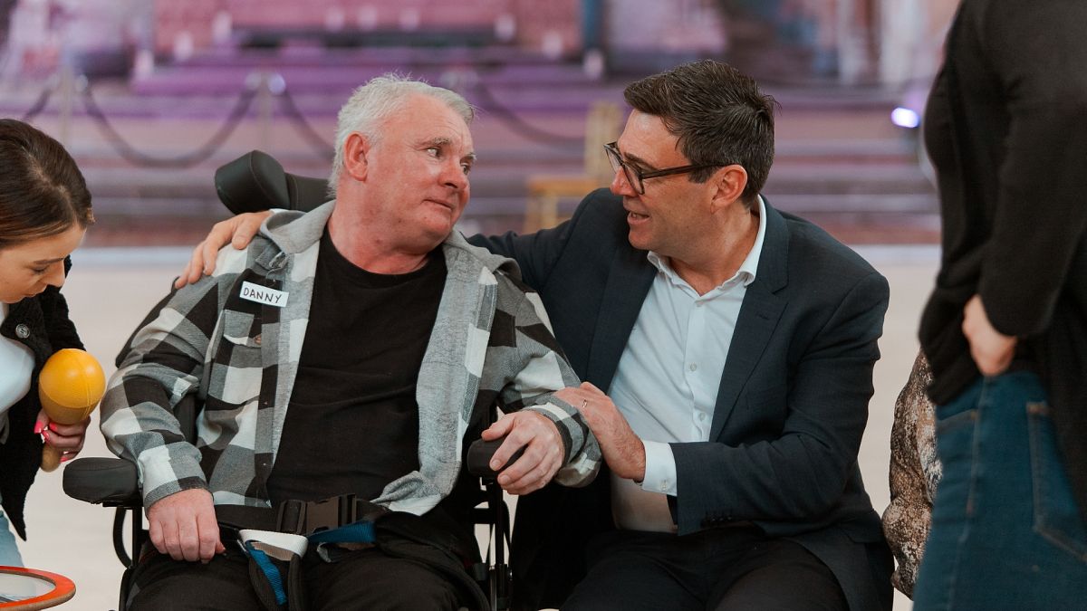 Danny enjoys the Music in Mind workshop with Manchester Mayor Andy Burnham, who attended the announcement of the new programme