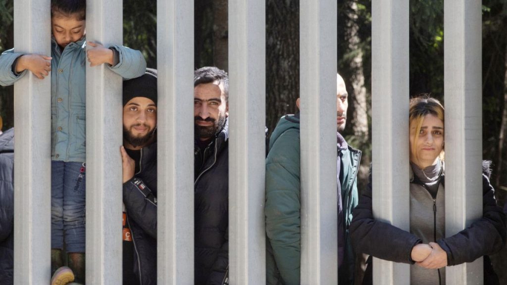 Members of a group of some 30 migrants seeking asylum are seen in Bialowieza, Poland, on Sunday, 28 May 2023.