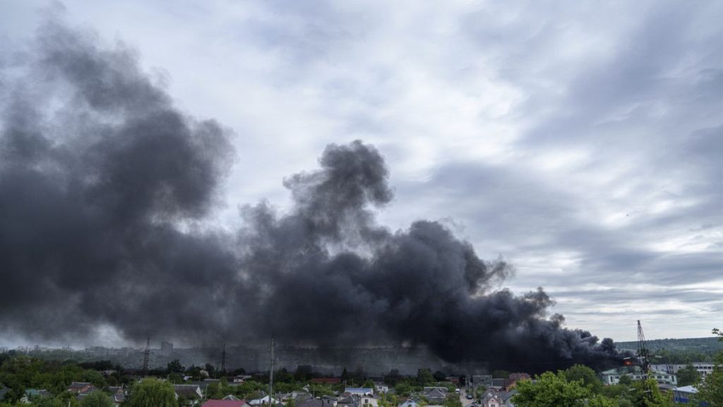 Smoke rises after a Russian attack in Kharkiv, Ukraine, Friday, May 17, 2024.