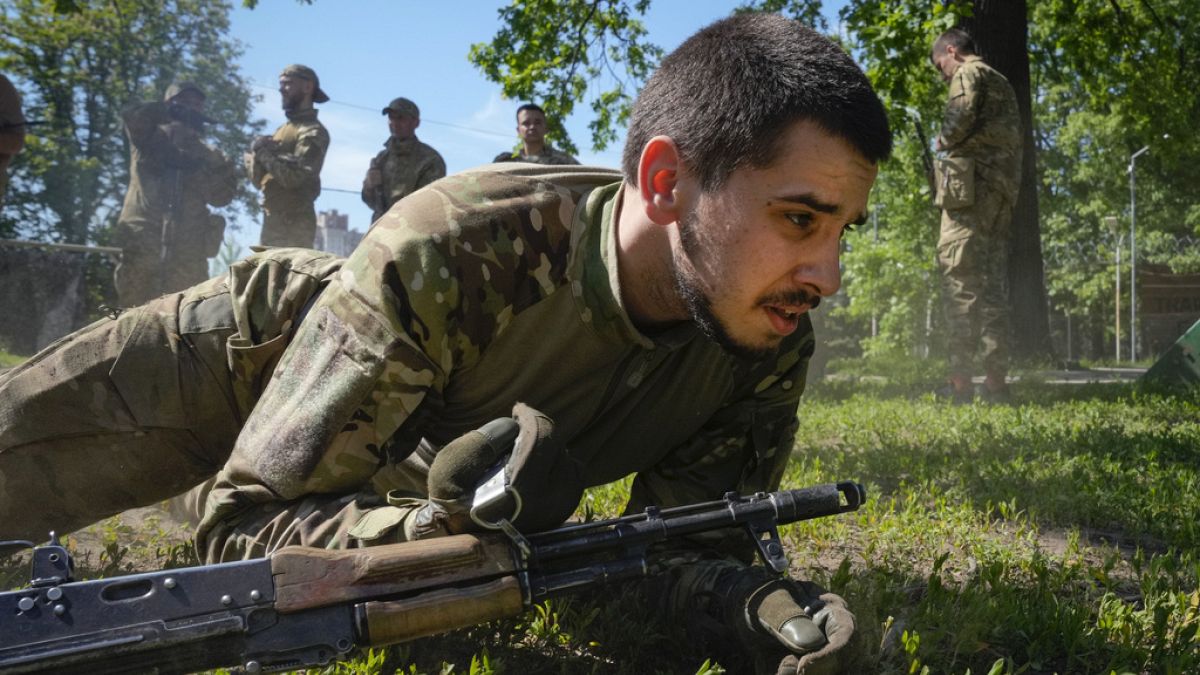 Newly recruited soldiers of the 3rd assault brigade train in Kyiv, Ukraine, Friday, May 17, 2024