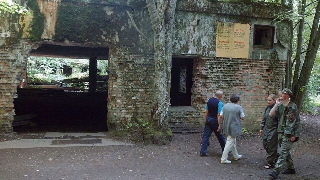 Tourists visit the ruins of Adolf Hitler