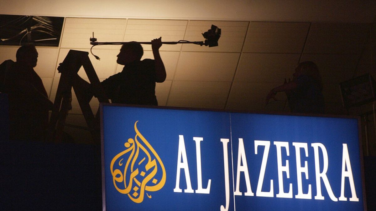 Workmen put the finishing touches on the media skybox for the Al-Jazeera satellite news channel inside Madison Square Garden in New York (AP Photo/Charlie Neibergall)