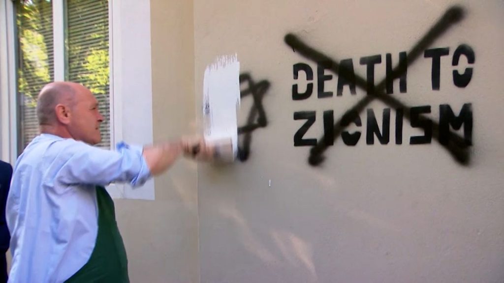 Austrian parliament president and Israeli ambassador paint over antisemitic graffiti, Leopoldstadt,AUSTRIA