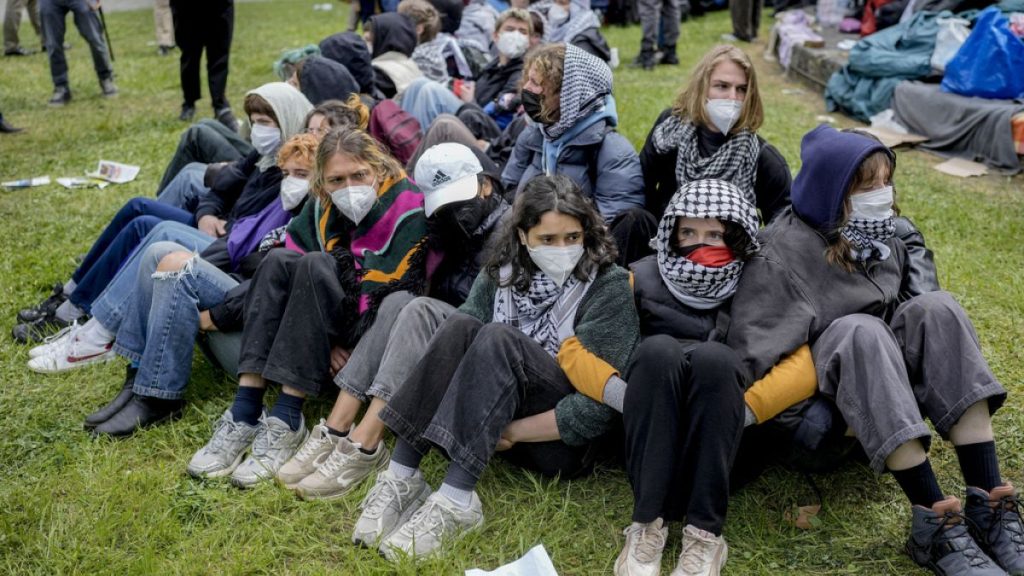 Participants sitting together during a pro-Palestinians demonstration  in the theater courtyard of the