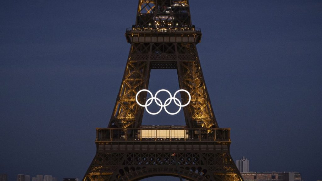 Olympic rings are seen on the Eiffel Tower Friday, June 7, 2024, in Paris. (AP Photo/Aurelien Morissard)