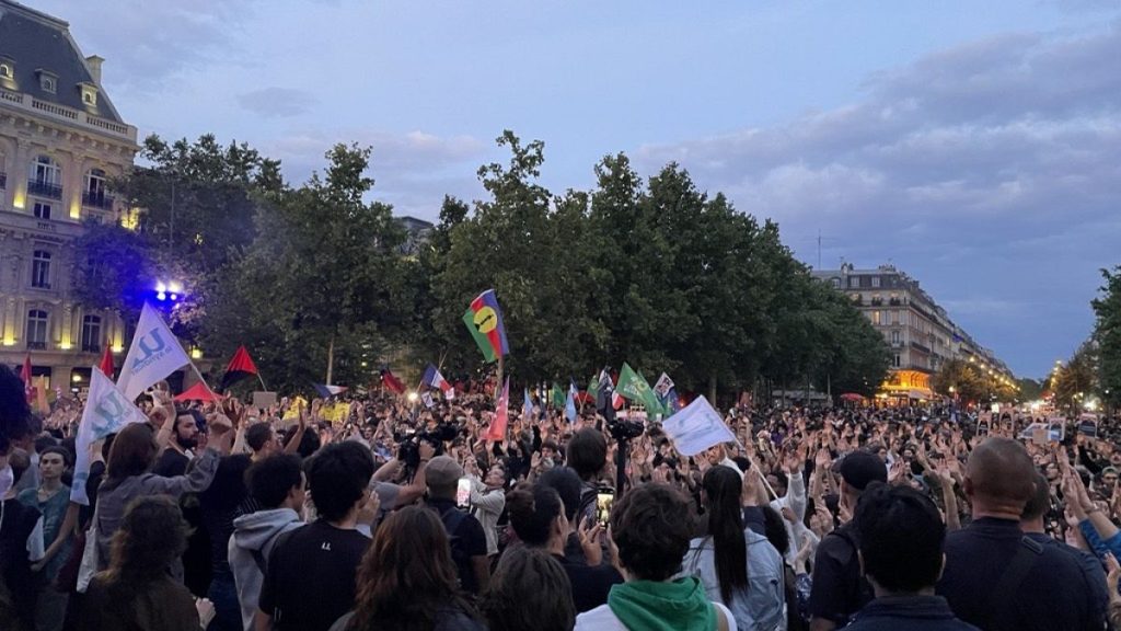 Protesters gather after the French election results in the first round of the legislative elections.