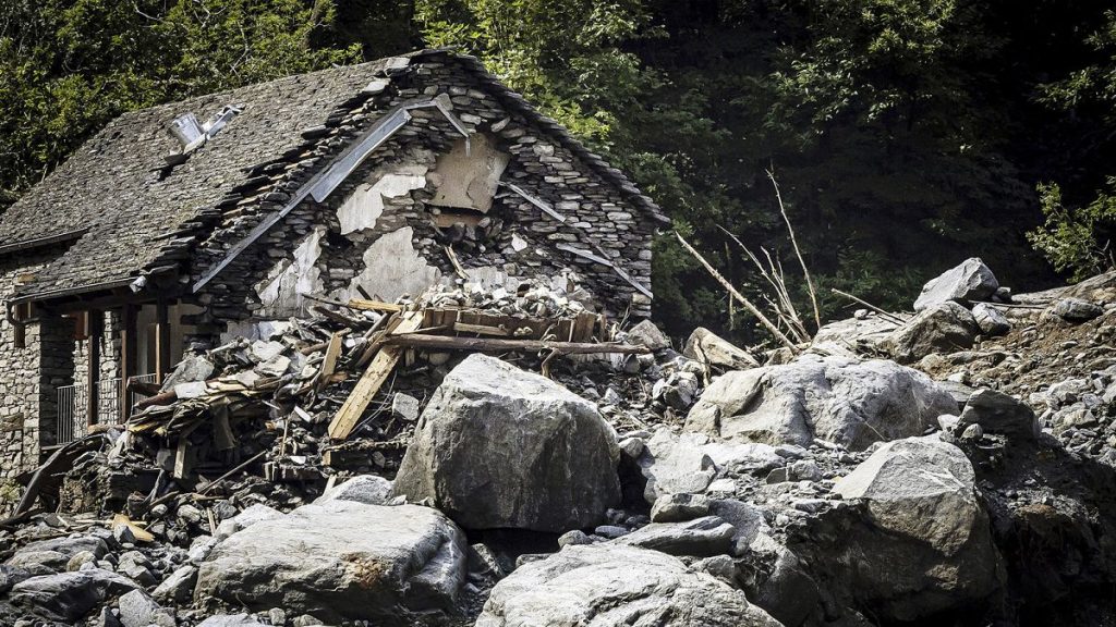 A massive landslide and destroyed houses are seen in Fontana, Val Bavona, in the Maggia Valley, near Cevio, 30 June 2024