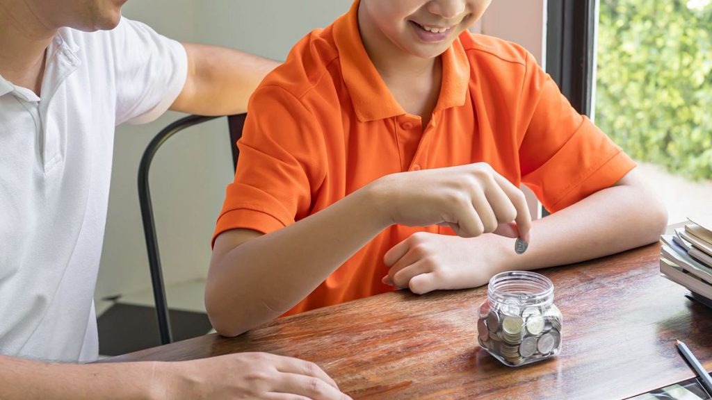 Young person learns how to manage money.