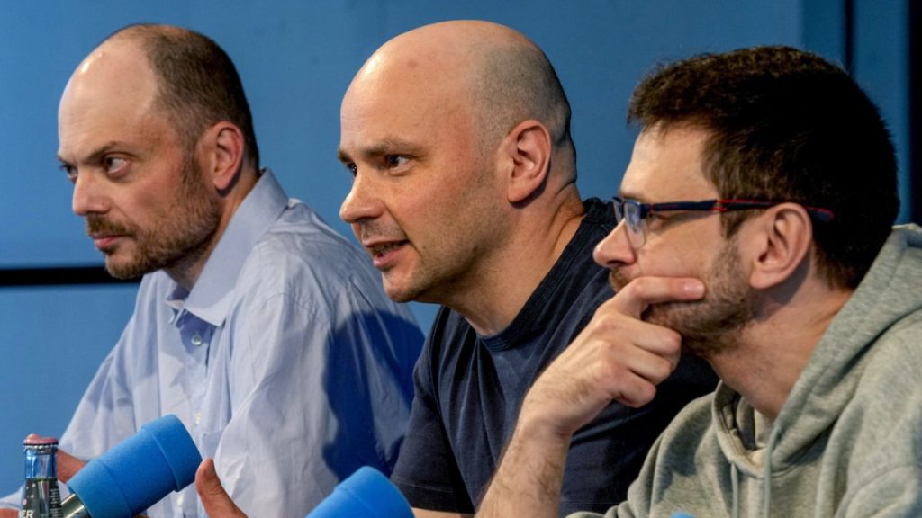 Freed Russian prisoners Ilya Yashin, from right, Andrei Pivovarov and Vladimir Kara-Murza, speak during a press conference in Bonn, Germany, Friday, Aug. 2, 2024 (AP Photo/Mic