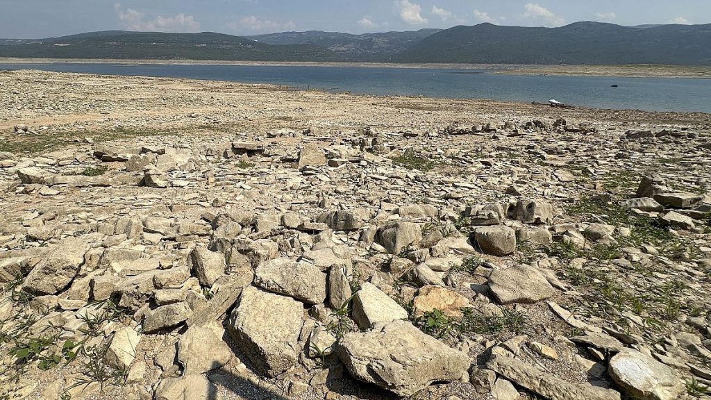 The dried up Bileca lake, near the town of Bileca, Bosnia, Thursday, Sept. 5, 2024.