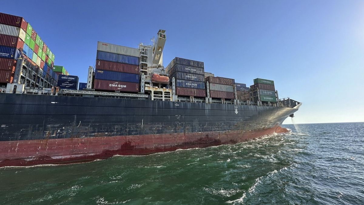 FILE - Container ship sails through the temporary corridor established for merchant vessels from Ukraine