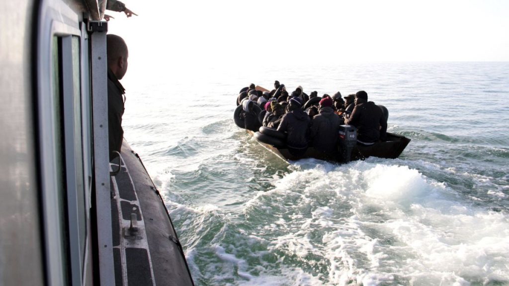 Migrants are stopped by Tunisian Maritime National Guard at sea during an attempt to get to Italy, near the coast of Sfax, Tunisia, on April 18 2023