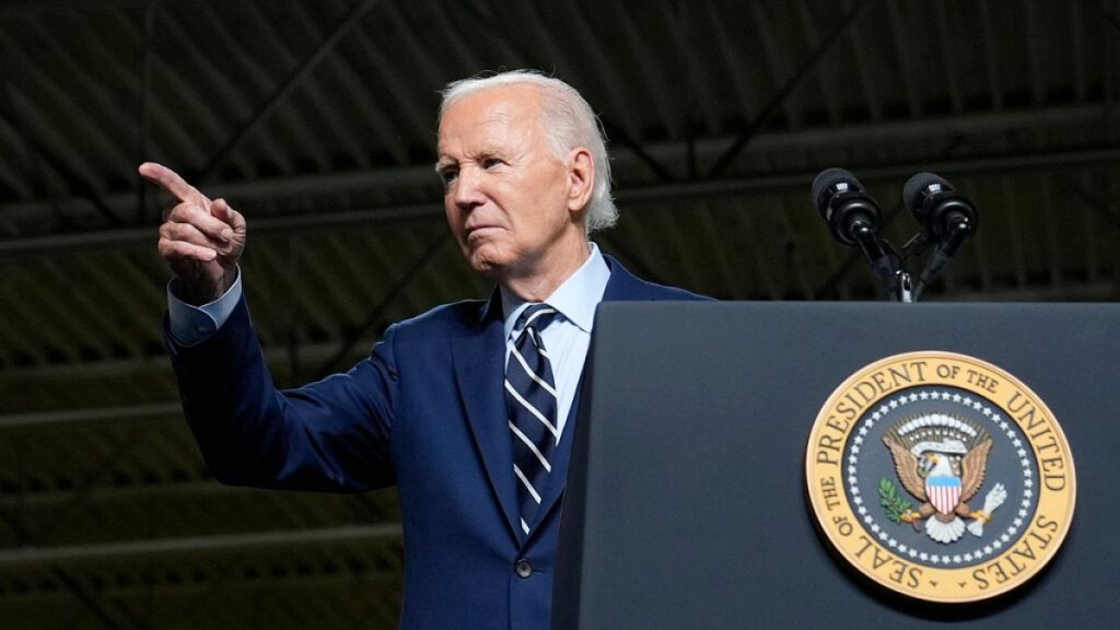 President Joe Biden points to someone in the audience after speaking at an event at the Milwaukee Department of Public Works in Milwaukee, Tuesday, Oct. 8, 2024.