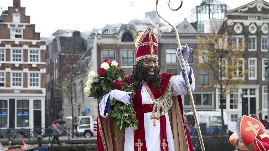 Sinterklaas, the Dutch version of Santa Claus and traditionally played by a white person, arrives in Amsterdam, Netherlands in 2016
